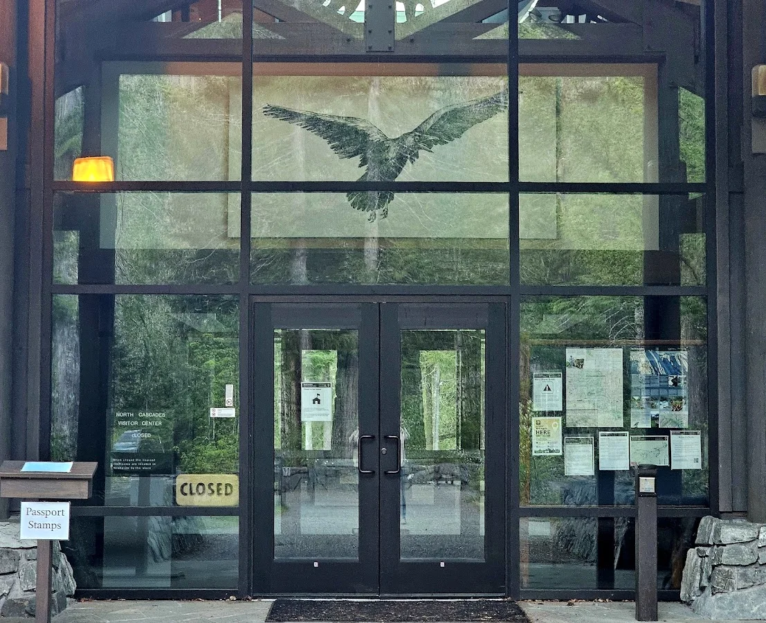 Apgar Visitor Center and main parking area at the western end of Lake McDonald in Glacier National Park