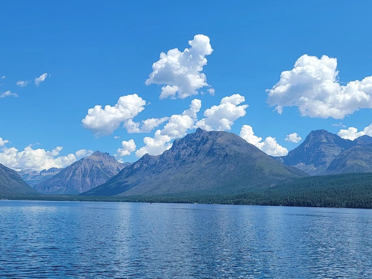 Glacier Park Boat Company dock with historic wooden DUC boats at Lake McDonald Lodge