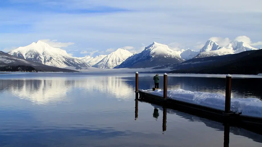 Crystal-clear shallow waters at Lake McDonald shoreline near Apgar