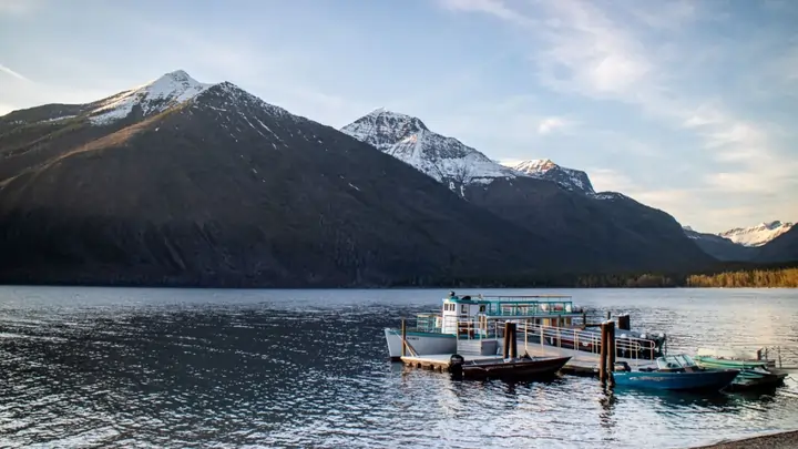 Historic wooden boat on Lake McDonald during a guided tour